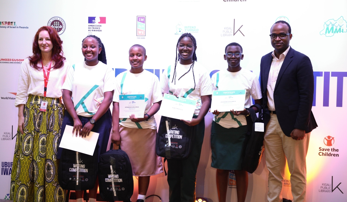 The Minister of State in charge of Primary and Secondary Education, Gaspard Twagirayezu poses for a photo with the overall winners in the upper secondary category during the awarding ceremony in Kigali on Saturday, June 3. All photos by Craish Bahizi