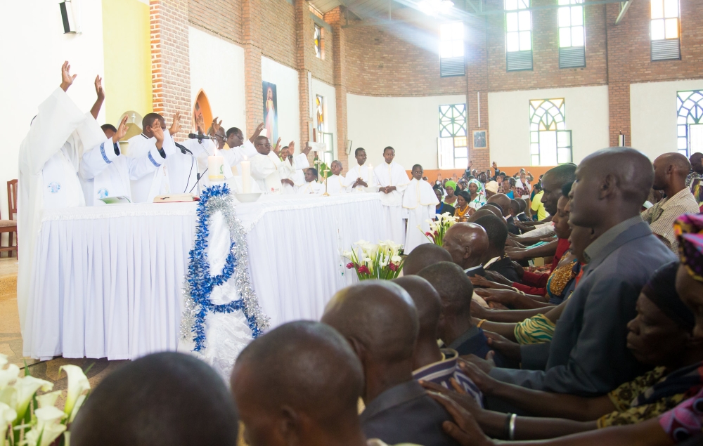 Clerics pray for church members who committed Genocide after asking for forgiveness to the survivors during a mass at Nyamata Catholic Church in 2017. File