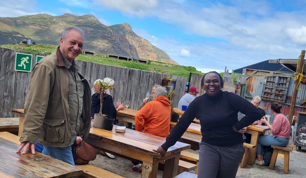 (L-R) Mark posed for a photo with Lumbasi at a restaurant in Hout Bay, South Africa.