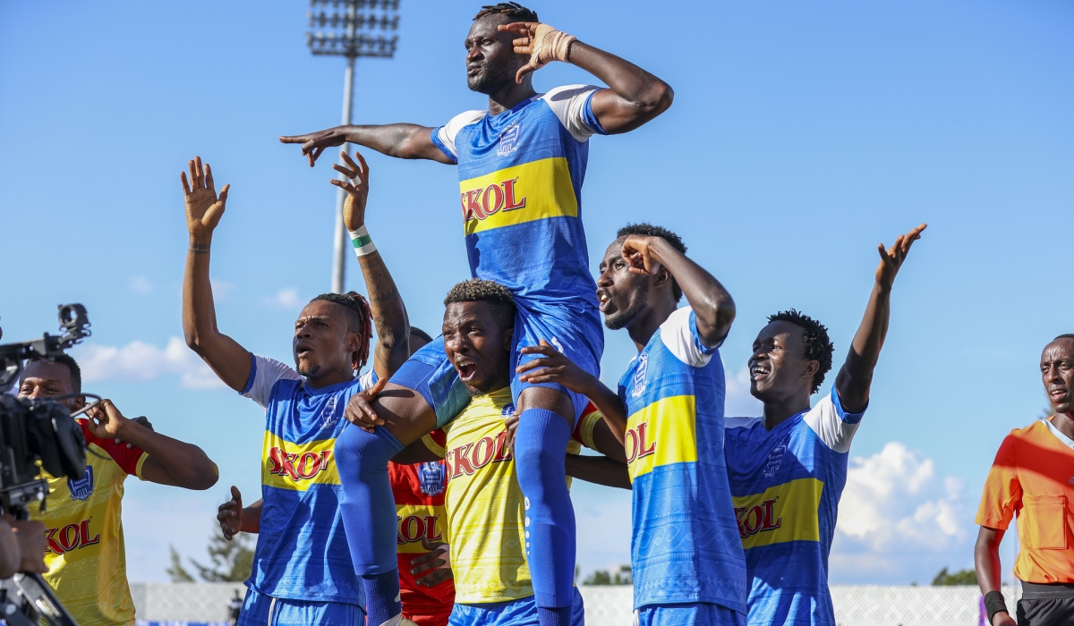 Rayon Sports goal scorer Eric Ngendahimana celebrates with his teammates after shocking APR FC 1-0 to win the 2023 Peace Cup title at Huye Stadium on June 3. Olivier Mugwiza