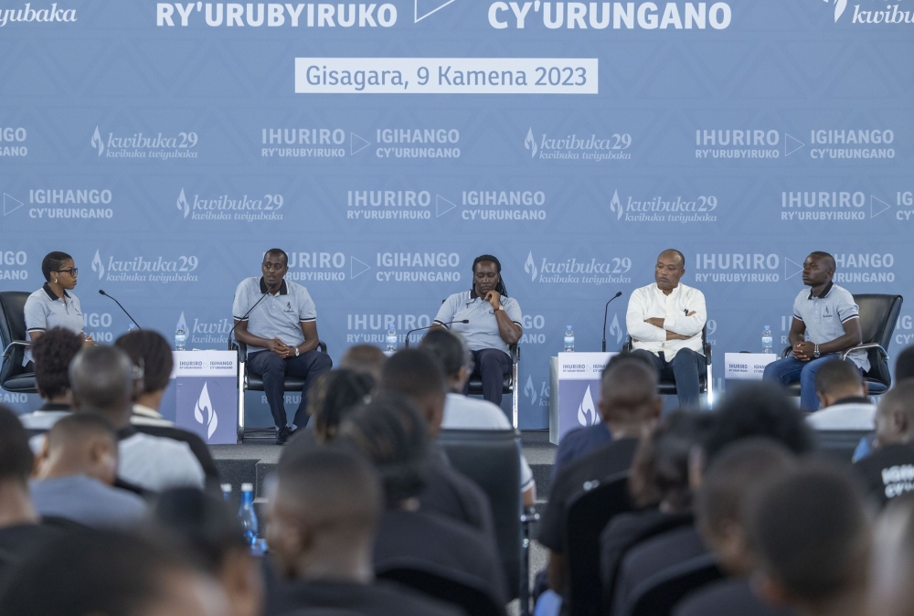 Mourners follow a panel discussion on  the role of youth in protecting and sustaining what has been achieved and promoting Ndi Umunyarwanda as an identity they all share. 