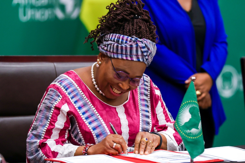 The AU Commissioner for Health, Humanitarian Affairs, and Social Development, Minata Samate Cessouma, signs the agreement in Kigali. The AU Commissioner for Health, Humanitarian Affairs, and Social Development, Minata Samate Cessouma, signs the agreement in Kigali.