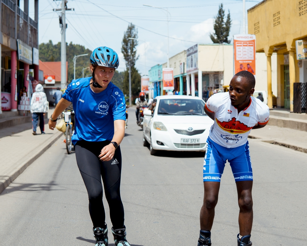 Hanna Wacheter (L) skating in the streets of Musanze. she is among skaters who won medal at the 2023 Skating Memorial tournament that took place in Musanze town over the weekend-courtesy (1)