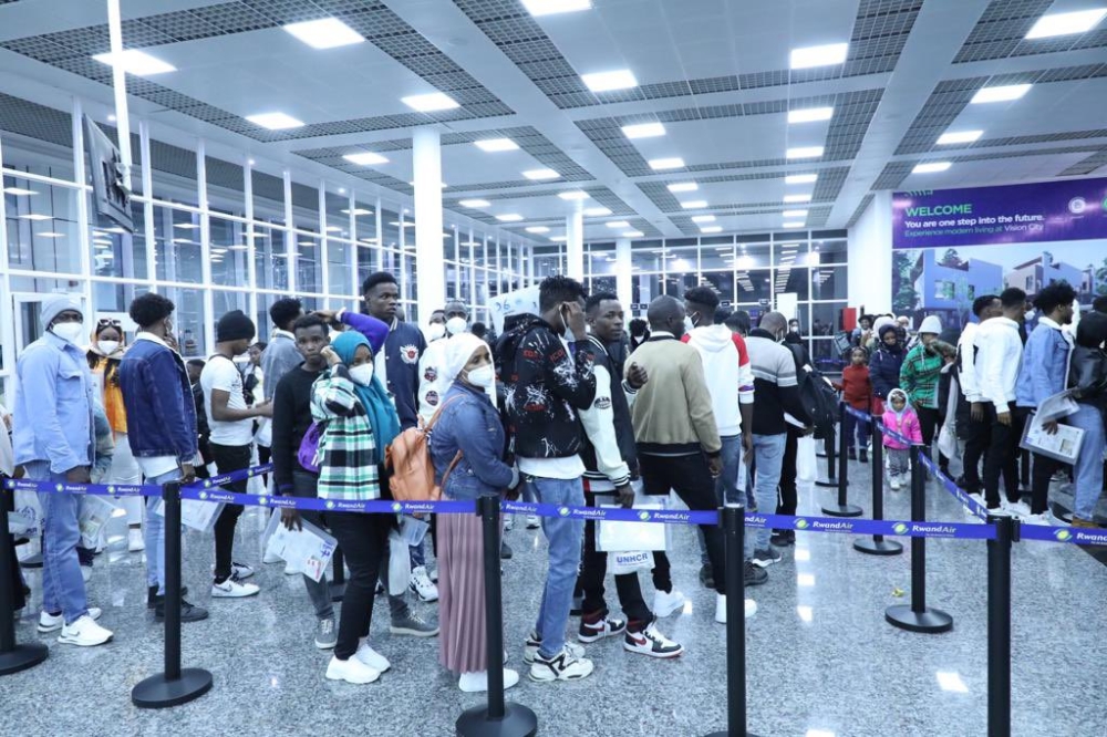 Some of the 134 refugees and asylum seekers evacuated from Libya on their arrival at Kigali International Airport on Monday, June 12. The group becomes the 14th to arrive in the country since the evacuation began in 2019. According to the Ministry in charge of Emergency Management, the latest group includes Eritreans (64), Sudanese (35), Somalis (15), Ethiopians (17), two Cameroonians and one Malian. They will be accommodated in Gashora Transit Centre in Bugesera District. Courtesy
