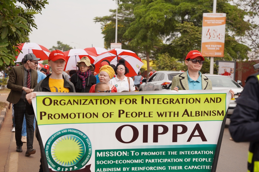  Members of Organization for the Integration and Promotion of People with Albinism (OIPPA) during a walk to raise awareness on the International Albinism Awareness Day in Kigali, on June 13. While celebrating the day, they revealed  that the sense of celebration is due to achieving significant milestones as a community that needs recognition. Photo by   Emmanuel Dushimirimana
