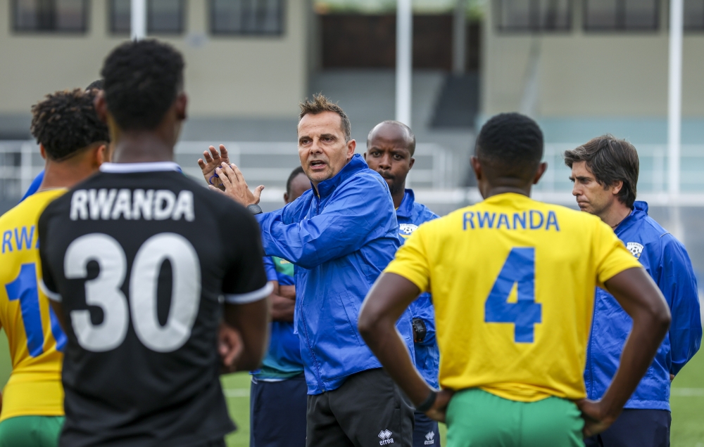 National football team head coach Carlos Alos Ferrer gives briefings to the players during a training session at  Kigali Pele Stadium on June 13. Olivier Mugwiza