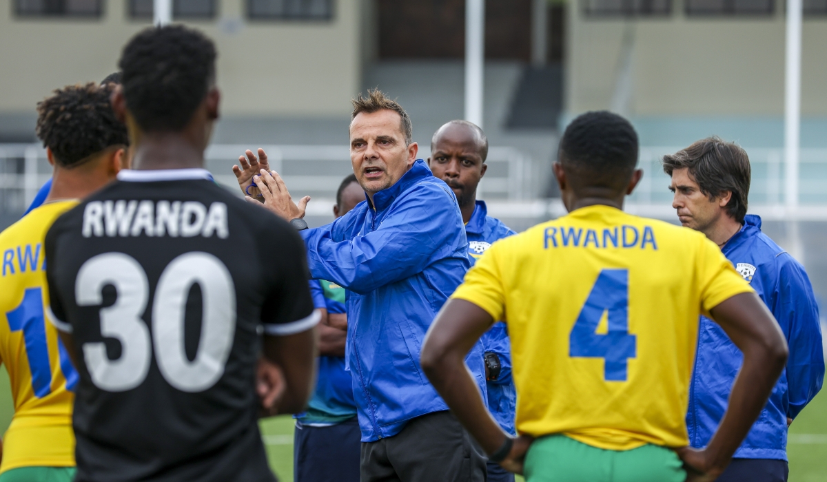 National football team head coach Carlos Alos Ferrer gives briefings to the players during a training session at  Kigali Pele Stadium on June 13. Olivier Mugwiza