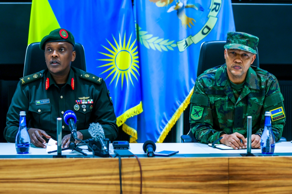 Rwanda Defence Force spokesperson Brig Gen Ronald Rwivanga and Col Lambert Sendegeya, in charge of RDF personnel or Chief J1, address journalists during a news briefing at the RDF headquarters in Kimihurura on Wednesday, June 14. The two senior officers shed light on recent developments that involved dismissal of two generals. Photo by Olivier Mugwiza