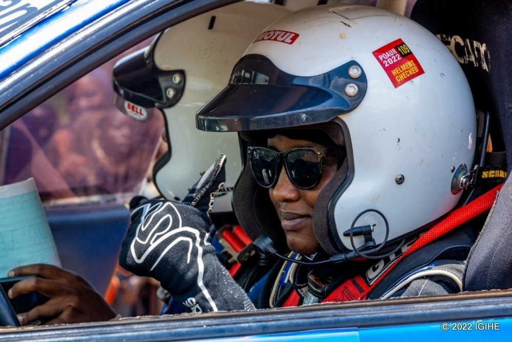 Queen Kalimpinya, a fast-rising rally driver and former finalist in Miss Rwanda beauty pageant during the competition. Photo by Igihe.com