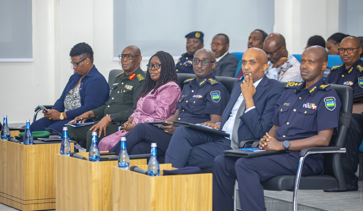 The NPC commandant (CP) Rafiki Mujiji, IGP Felix Namuhoranye, Justice Minister, Dr. Emmanuel Ugirashebuja, Governor-Northern Province, Dancille Nyirarugero, Maj Gen Eric Murokore, Regional Reserve Force Commander-Northern and RGB Chief Executive Officer, Usta Kaitesi, during the symposium.