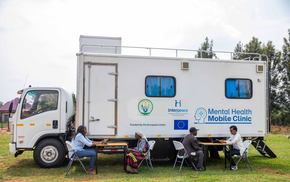 Specialists on mental health during an outreach program to meet residents upcountry for raising awareness on mental health issues. Courtesy