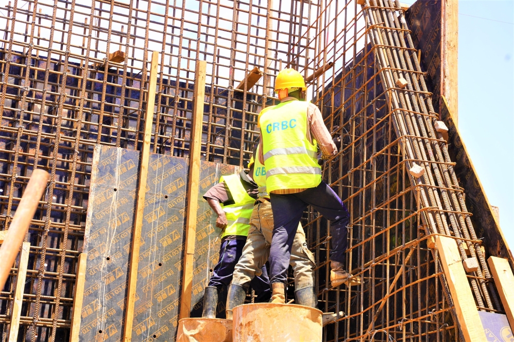 Construction workers on duty. The government has announced a 10% increase in customs duty on imported construction materials. Craish Bahizi