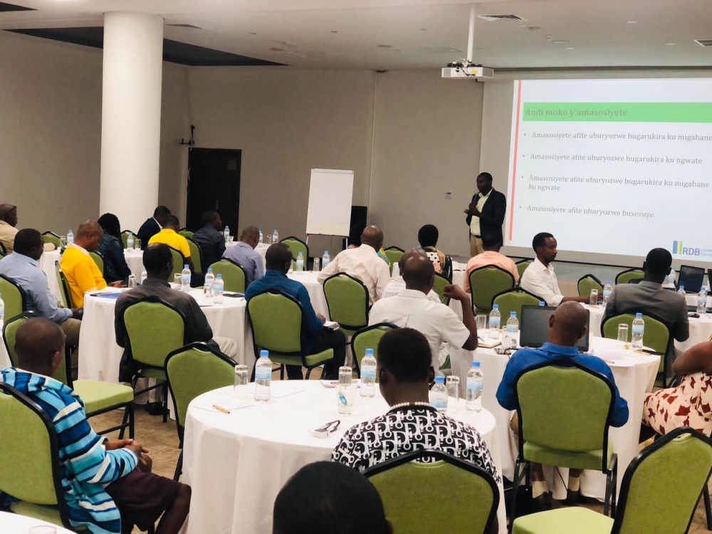Participants follow a presentation during a workshop where RDB raises awareness on  all registered companies to adhere to compliance requirements set forth by Law N° 0072021. Courtesy