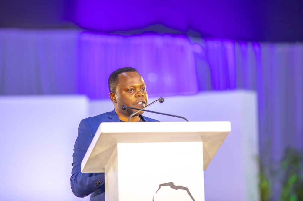 Youth Minister, Abdallah Utumatwishima addresses delegates   during the CorpsAfrica event held at Kigali Conference and Exhibition Center (KCEV)on June 16. courtesy