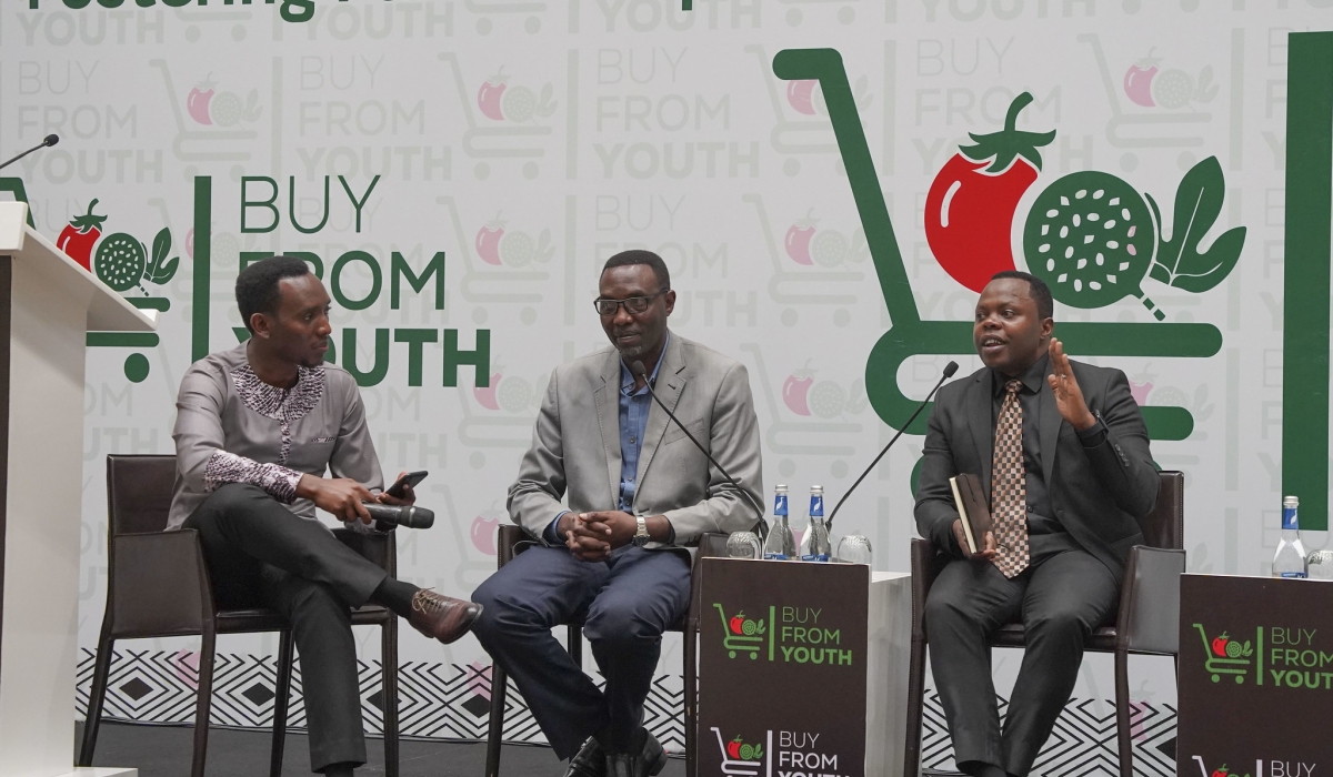 Dr Abdallah Utumatwishima, Rwanda’s Minister of Youth (R), speaks during a panel discussion.He emphasized that it’s time for young people in agriculture to shine, be supported, and be recognised for the transformation.