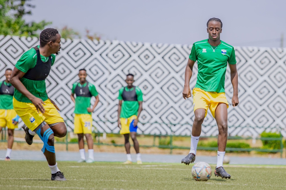 Rwanda&#039;s international player Sahabo with the ball during a training session at Huye Stadium on Saturday. Courtesy