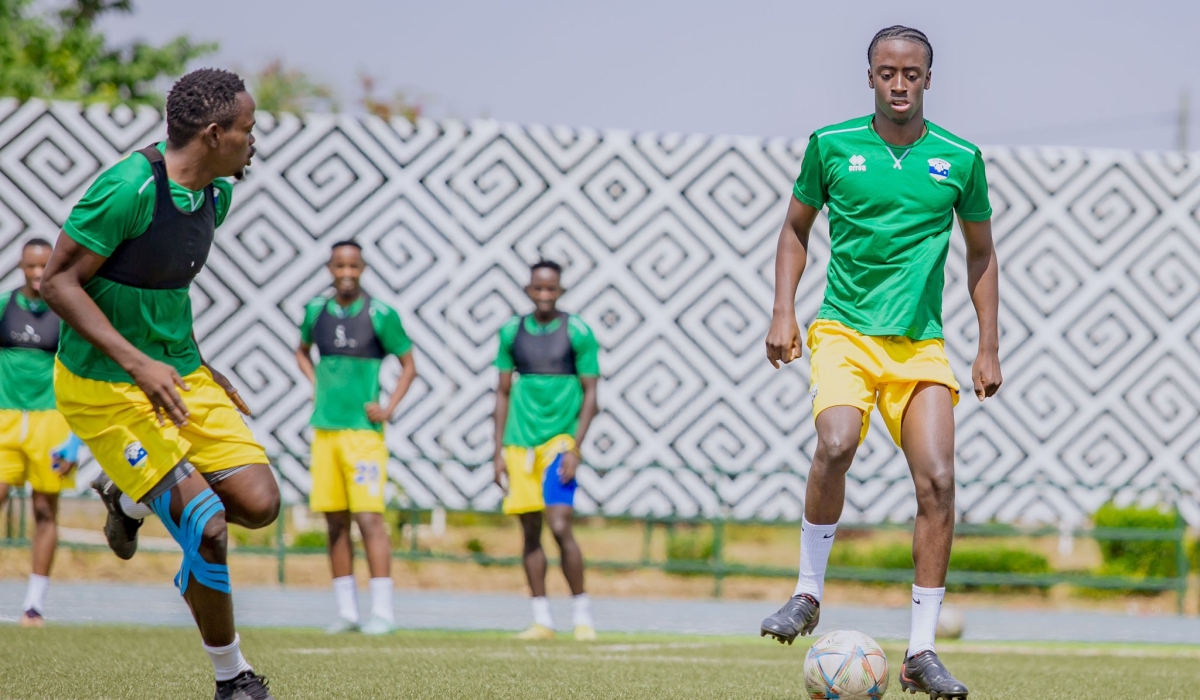 Rwanda&#039;s international player Sahabo with the ball during a training session at Huye Stadium on Saturday. Courtesy