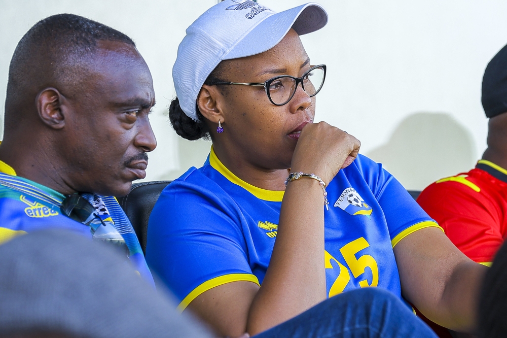 A dejected sports minister, Aurore Mimosa Munyangaju and her husband look on as Amavubi suffer a 2-0 defeat at Huye Stadium on Sunday, June 18. All photos by Olivier Mugwiza