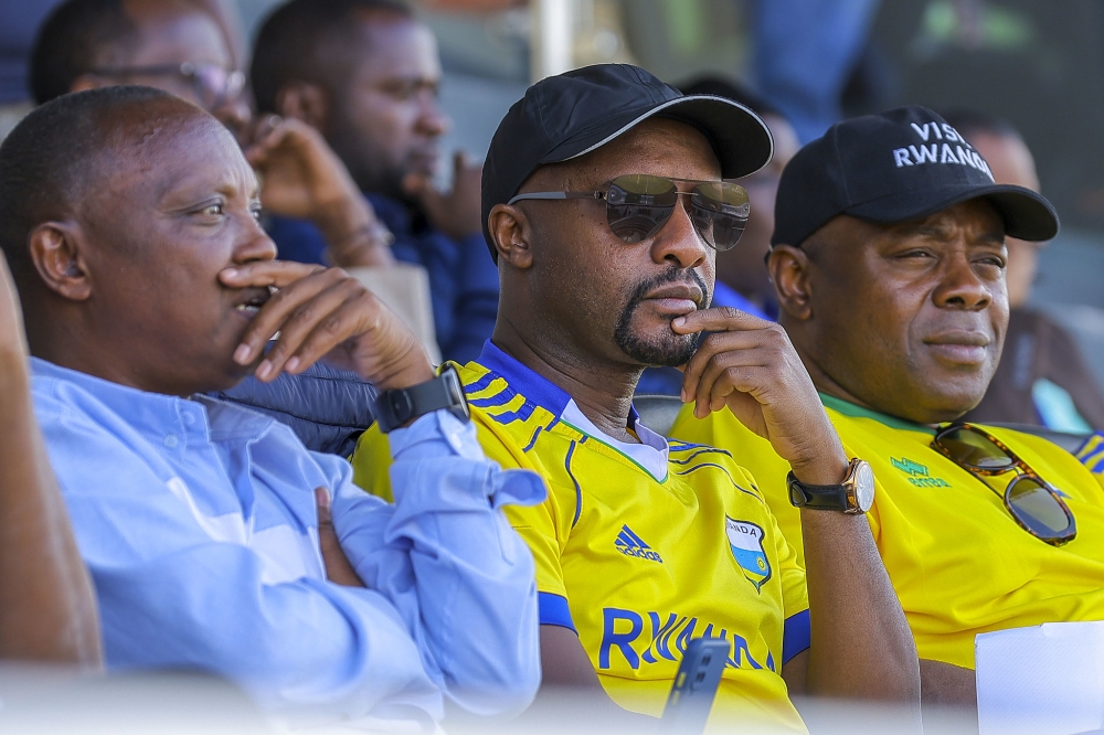 National team supporters look dejected during the game. They saw their hopes disappear as the game progressed into the second half with a goal down, before the guests doubled the lead. Photo by Olivier Mugwiza