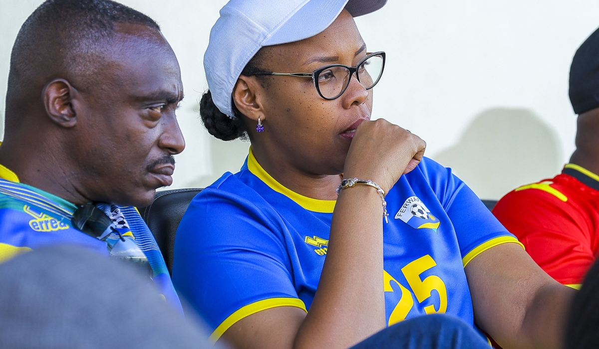 A dejected sports minister, Aurore Mimosa Munyangaju and her husband look on as Amavubi suffer a 2-0 defeat at Huye Stadium on Sunday, June 18. All photos by Olivier Mugwiza