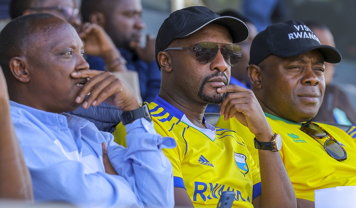 National team supporters look dejected during the game. They saw their hopes disappear as the game progressed into the second half with a goal down, before the guests doubled the lead. Photo by Olivier Mugwiza