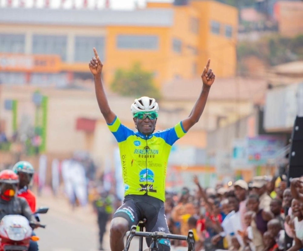 Patrick Byukusenge celebrates the victory as he wins National Road Race  Championship on Sunday. Courtesy