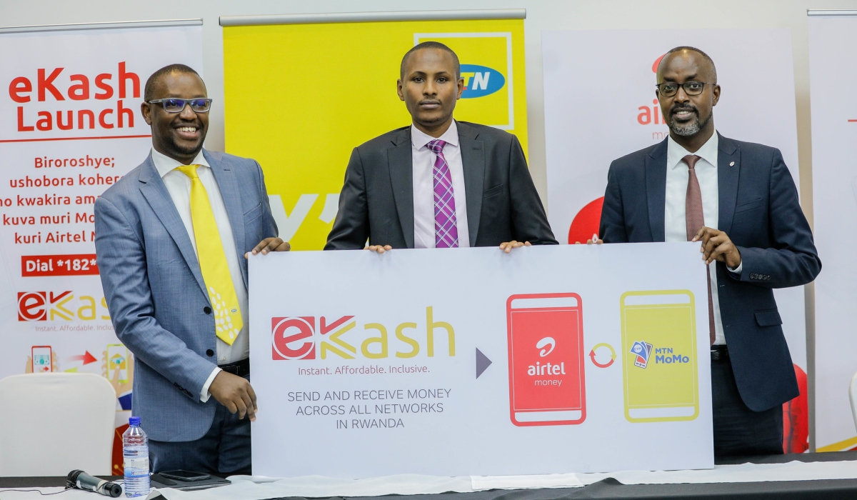 Christian Kajeneri, Fintech Strategy, Products and Services at Mobile Money; Mathieu Rwiyereka, Founder, Managing Consultant Trustees Ltd; Jean-Claude Gaga, Managing Director of Airtel Money, during the launch Ekash on May 26, 2022. File