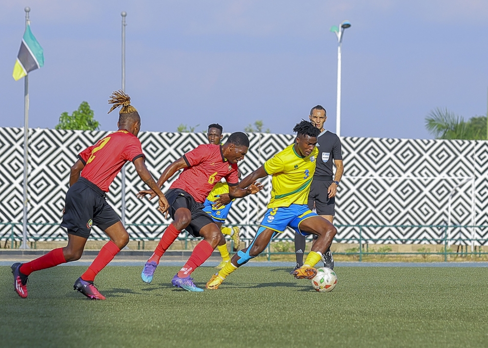 National football team Left-back Emmanuel Imanishimwe with the ball during match against Mozambique at Huye Stadium on Sunday June 18. Photo by Olivier Mugwiza
