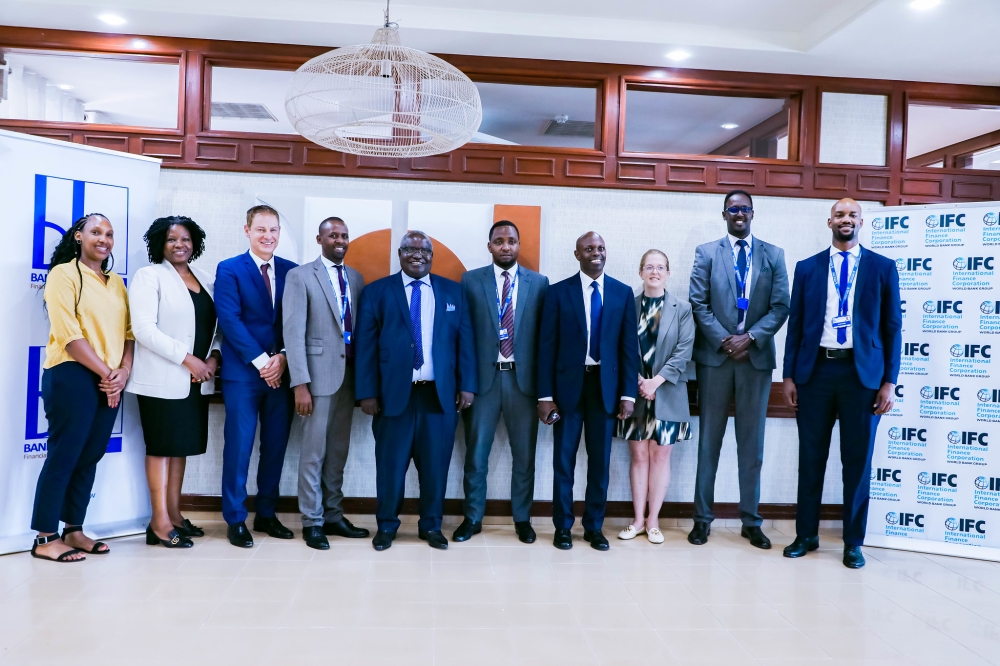 Officials from both delegations pose for a group photo after signing the agreement in Kigali on Tuesday, June 20. Photos by Craish Bahizi