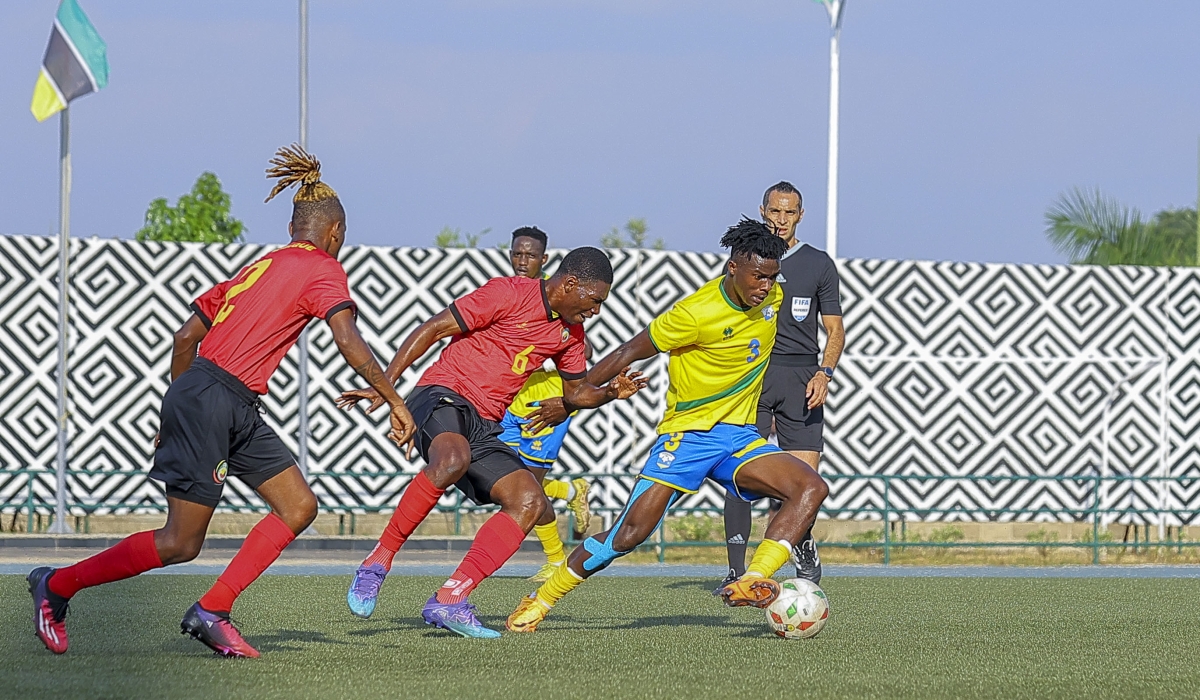 National football team Left-back Emmanuel Imanishimwe with the ball during match against Mozambique at Huye Stadium on Sunday June 18. Photo by Olivier Mugwiza