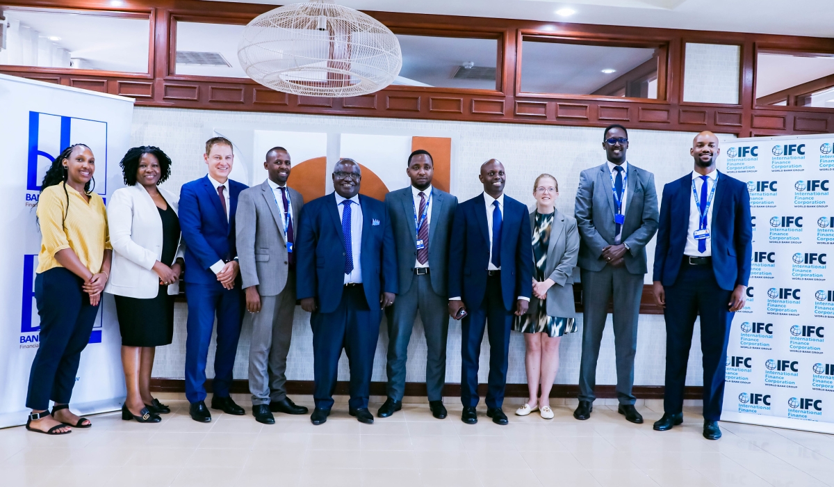 Officials from both delegations pose for a group photo after signing the agreement in Kigali on Tuesday, June 20. Photos by Craish Bahizi