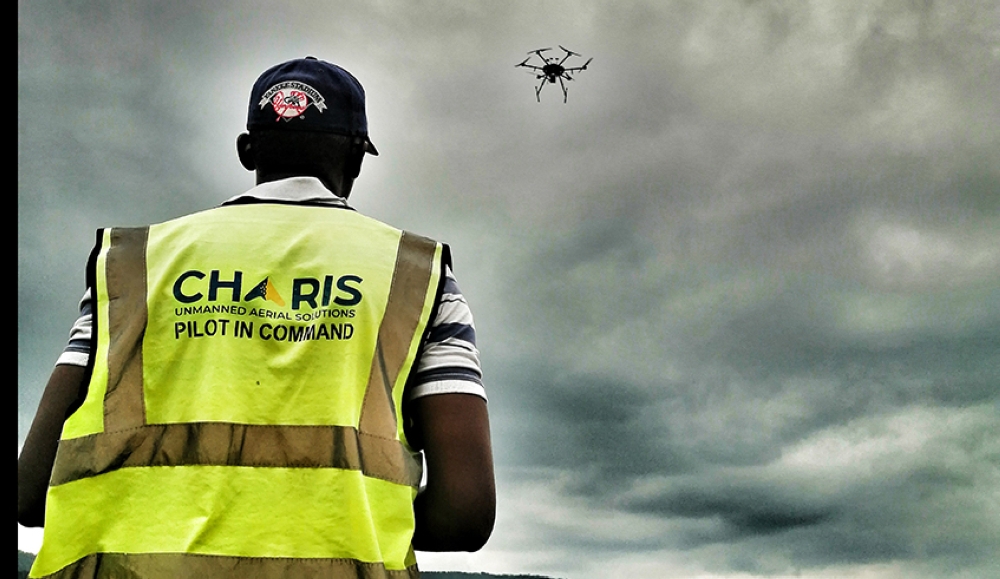A drone pilot with CHARIS test-flies a drone in Rwanda. The leading 3D geospatial drone data company was chosen chosen as one of the 25 recipients of the prestigious Google for Startups Black Founders Fund in Africa.