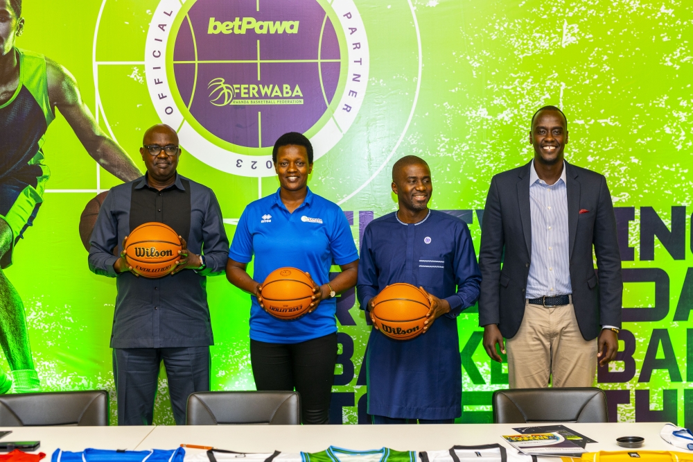 (L-R) Desire Mugwiza President of FERWABA, APR Women Captain Umugwaneza Charlotte, Mchezo Managing Director Ntoudi Mouyelo, Jean Luc Cyusa, Director at Mchezo at the signing event.Courtesy