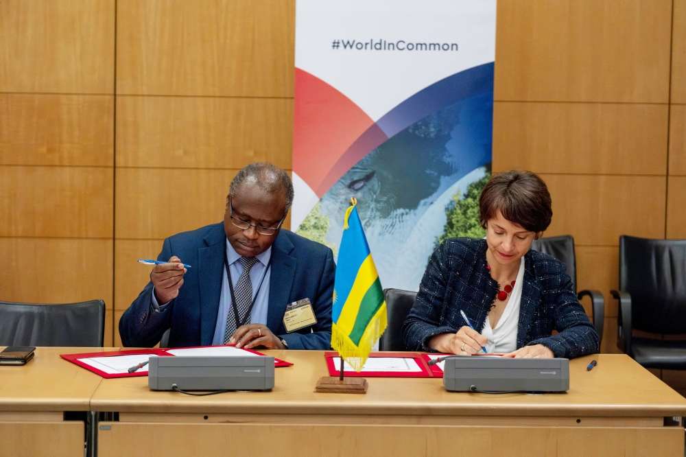 Minister for Finance and Economic Planning, Uzziel Ndagijimana signs for a new initiative for mobilizing  €300 million   for climate resilience in Rwanda, at the Paris Summit for a New Global Financing Pact on Thursday June 22.