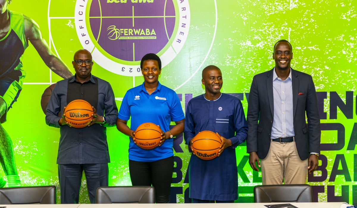 (L-R) Desire Mugwiza President of FERWABA, APR Women Captain Umugwaneza Charlotte, Mchezo Managing Director Ntoudi Mouyelo, Jean Luc Cyusa, Director at Mchezo at the signing event.Courtesy