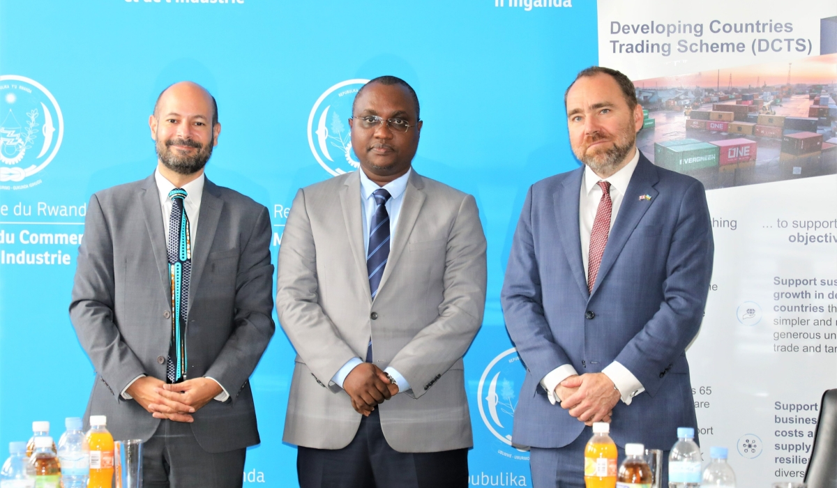 (L-R) The British High Commissioner to Rwanda, Omar Daair, Minister for Trade and Industry, Jean-Chrysostome Ngabitsinze and Paul Whittingham, Head of the UK’s Trade for Development department in London pose for a photo. Courtesy