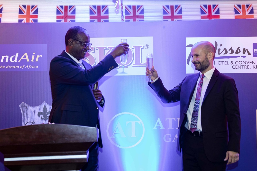 Minister of State for East African Community Affairs, Manasseh Nshuti and British High Commissioner to Rwanda, Omar Daair toast during the celebration of King Charles III’s birthday in Kigali on June 22. All photo by  Christianne Murengerantwari