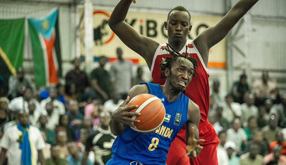 Point guard Nshobozwa with the ball during the game. Rwanda has qualified for the 2023 FIBA AfroCAN tournament, thanks to a 70-48 victory over Burundi in the final game of the Zone V qualifiers.Courtesy