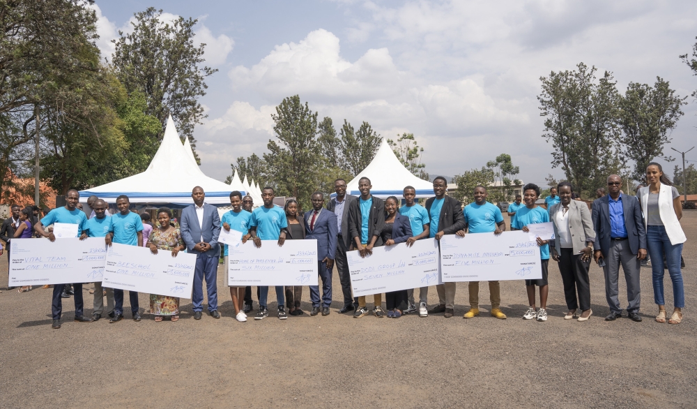  Officials pose for a photo with the winners  whose projects were incubated in the Innovate for Smart Agro-Processing Hackathon on Friday, June 23. All photos by Emmanuel Dushimimana