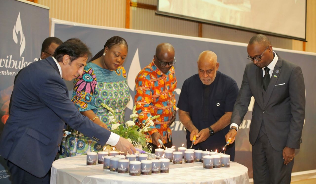 Officials light candles during the commemoration of the Genocide Against the Tutsi in Accra in Ghana. Courtesy