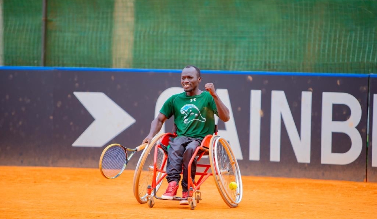 Champion Emmanuel Hakizimana celebrates after beating Ernest Ndayishimiye 2-1 sets in the final to win the Wheelchair tennis national tournament. Courtesy 