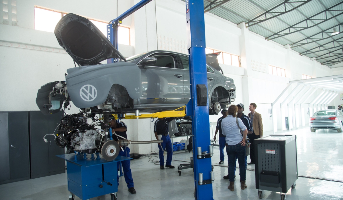 Technicians assemble a Volkswagen car at the firm in Kigali Special Economic Zone. Photo by Sam Ngendahimana
