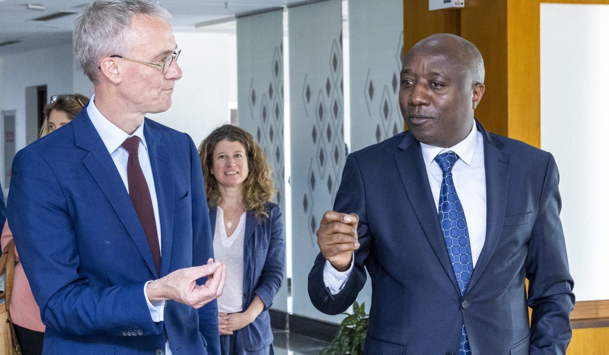 Prime Minister Edouard Ngirente  interacts with Koen Doens, Director General of International Partnerships after a meeting with the European Union  delegation, at his office on, Tuesday, June 27. Courtesy