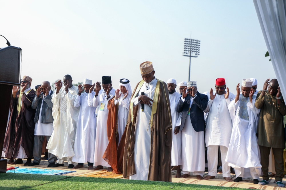 The Mufti of Rwanda, Sheikh Salim Hitimana leads the prayer at Pele Stadium on June 28. Eid-al Adha , the festival is Islam’s second, and most significant, major holiday.