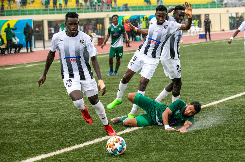 APR FC players vie for the ball during a recent Peace Cup match at Bugesera Stadium. Olivier Mugwiza