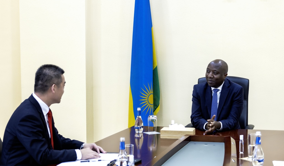 Prime Minister Edouard Ngirente meets with the Chinese Ambassador to Rwanda,  Wang Xuekun, at his office in Kigali on Friday, June 30. Courtesy