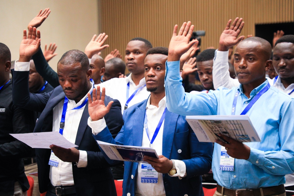 Some of the 124 new members of Institution of Engineers Rwanda take oath during an event to welcome them on Friday, June 30. All photos by Craish Bahizi.