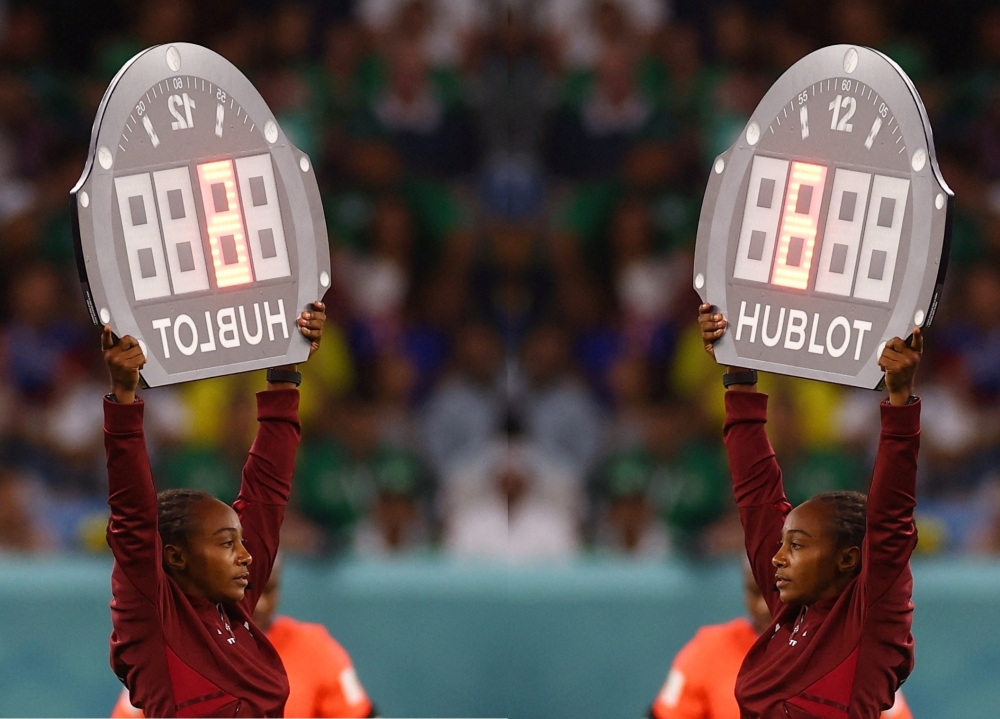 Rwandan referee Salima Mukansanga shows the stoppage time during the game as France face Australia on November 22, 2022. Courtesy