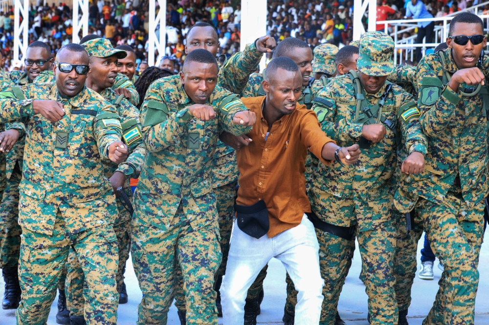Republican Guard (RG) Unit FC fans celebrate after beating Task Forces (TF) Division 1-0 in a  final to win the inaugural RDF football Liberation trophy on Monday, July 3. All photos by Craish BAHIZI