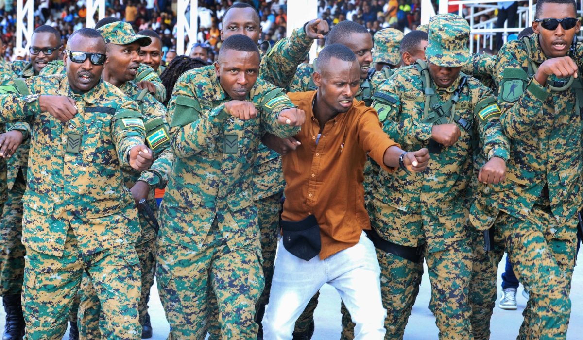 Republican Guard (RG) Unit FC fans celebrate after beating Task Forces (TF) Division 1-0 in a  final to win the inaugural RDF football Liberation trophy on Monday, July 3. All photos by Craish BAHIZI